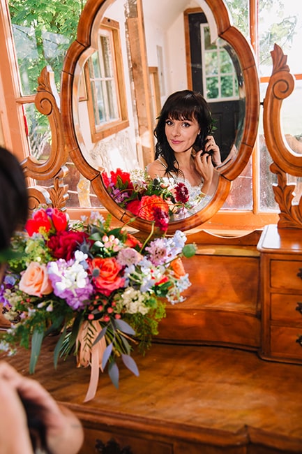 bride at mirror